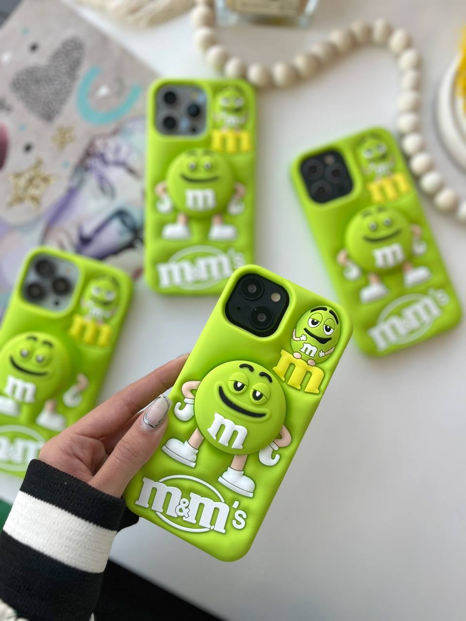 قاب سیلیکونی M&M گوشی آیفون 12 و آیفون 12 پرو